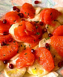 Carpaccio de radis noir et pamplemousse à la grenade
