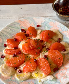 Carpaccio de radis noir et pamplemousse à la grenade